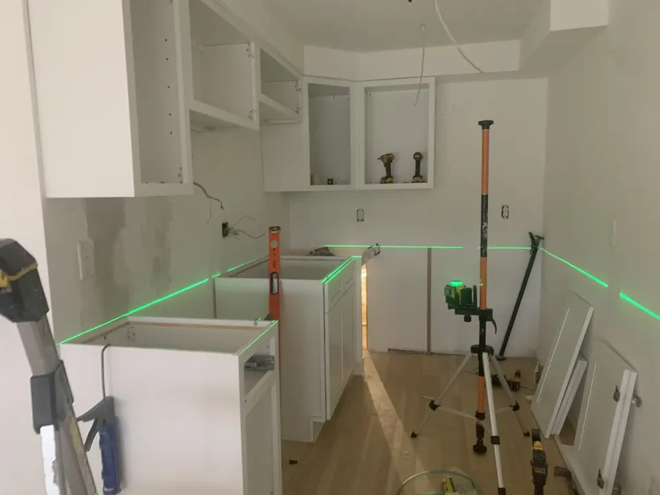 Apartment interior renovations: Kitchen and living spaces across several residential renovation projects.