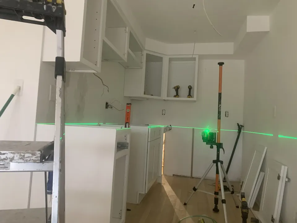 Apartment interior renovations: Kitchen and living spaces across several residential renovation projects.