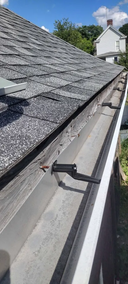 Roofing and exterior repairs: Roofing and exterior work, including visible shingle and trim repairs.