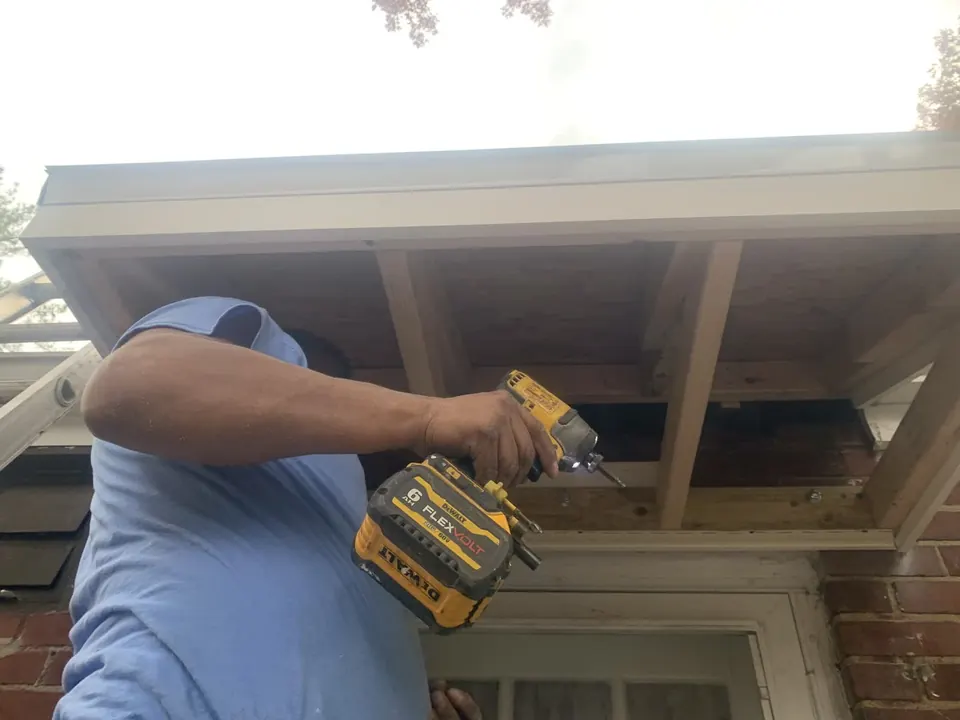 Window and exterior finish work: Window, deck-door, and exterior carpentry details.