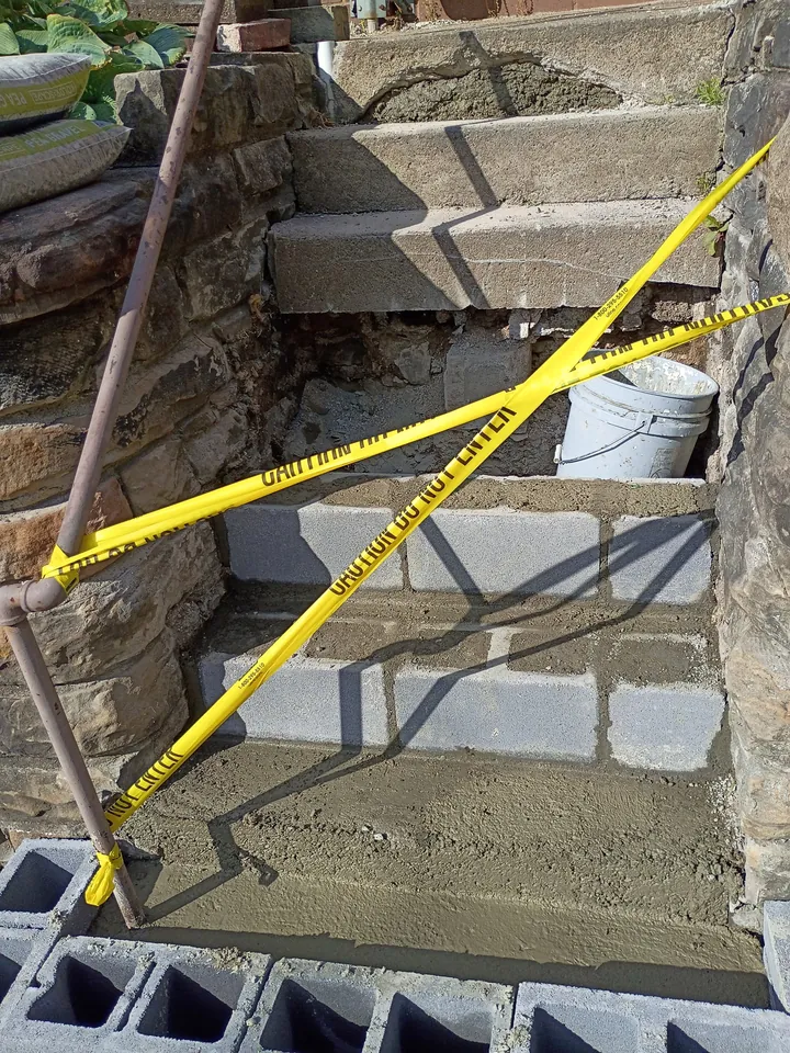 Concrete step repair in progress
