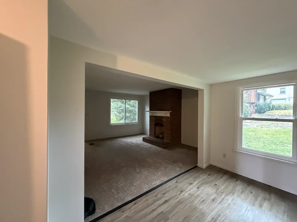 Carpeted adjoining living spaces